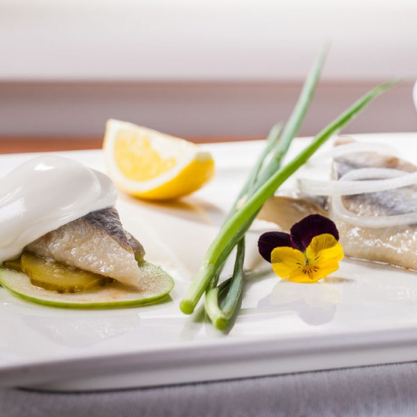 Marinated herrings served in two ways